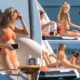 Breaking: Put on clothing; you are a mother of two. After matching her barely-there orange bikini to her sunglasses on Boat Day, Patrick Mahomes' wife received backlash...See More