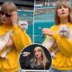 Breaking: Taylor Swift holds onto her CAT Olivia as she pulled off her black sunglasses slowly and looked around the Hard Rock Stadium in Miami, Florida...See More