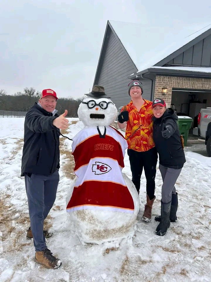 Moved from Kansas to Texas a year ago. We got our first snow and of coarse had to make a snowman. We love our Chiefs and our favorite coach Any Reid!!!